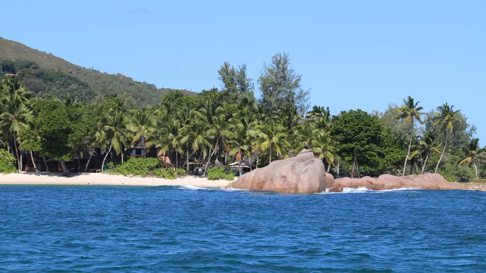 A granite outcrop standing alone in open sea